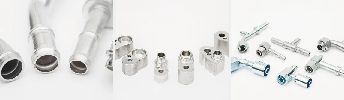 A row of hose and tube end fittings in steel and aluminum